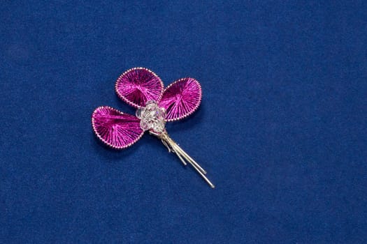 Ganutell modern pink wire-work with beads on violet background
