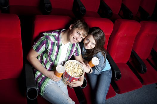 couple in a movie theater, watching a 3D movie