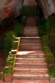 Ancient steps in rock fortress and palace on high Lion's rock , Sigiriya