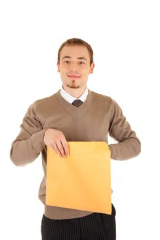 Young business man opens a yellow post package with smile. Isolated on white.
