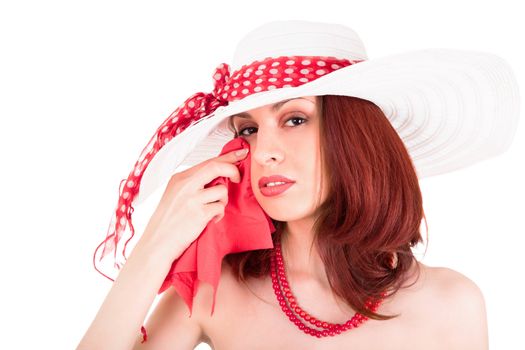 Crying retro stylish young woman in hat on white background