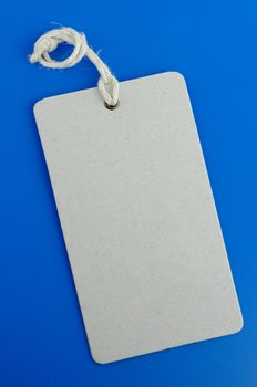 Blank product info label on blue background.