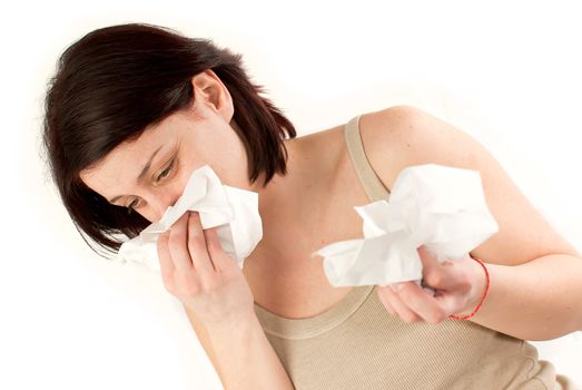 sneezing woman holding tissues, allergy or cold flu concept