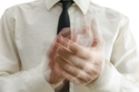 Close up of businessman blurred hands clapping.