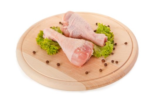 Fresh raw chicken legs isolated on white background, clipping path included 