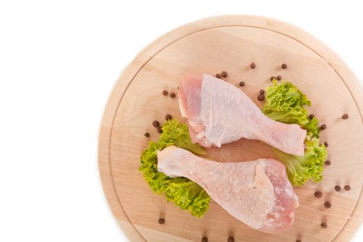 Close-up shot of fresh raw chicken legs, clipping path included 