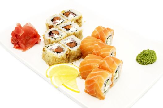 sushi with salmon and caviar on a white background in the restaurant
