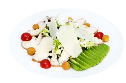 salad with meat and vegetables on a white background