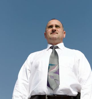 a businessman with blue background