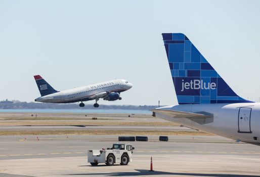 BOSTON, USA - MARCH 22: US Airways Airbus A319 takes off on March 19, 2012. Logan Airport is the largest in New England