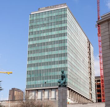 Modern skyscraper office building being demolished in Brussels