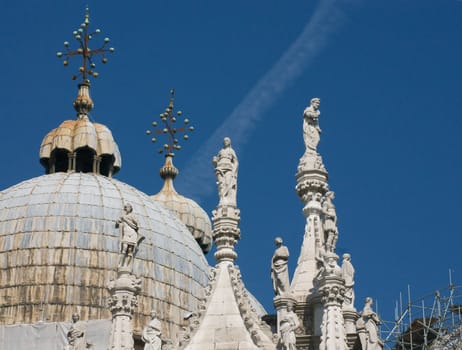 Sculptures of the cathedral of San Marco in Venice on the sky background