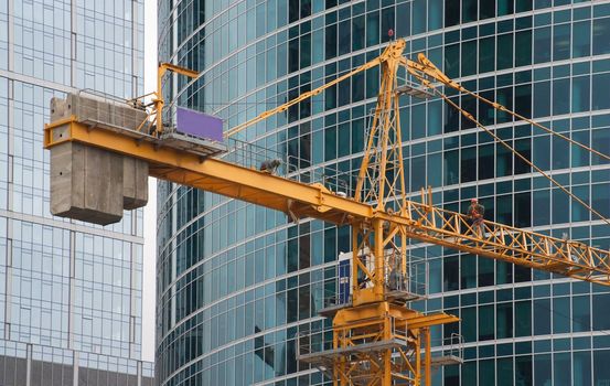 The lifting crane at a construction site