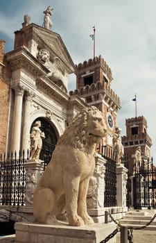 Lion sculpture in front of the gates of of Venetian Arsenal