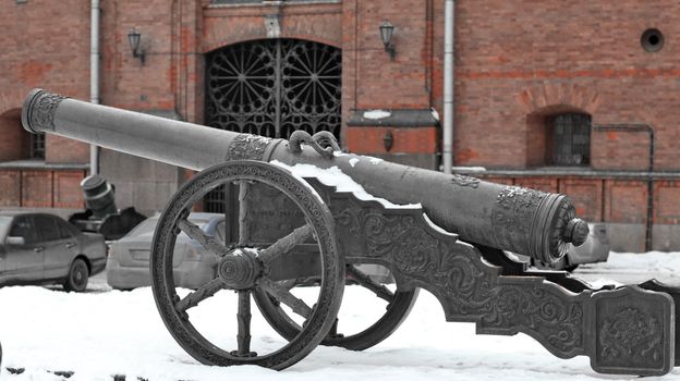 old medieval bronze cannon on the gun carriage