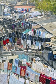 laundry out to dry after washing on wash line patterns at Dhobhi Ghat Mumbai