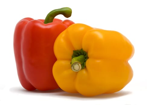 sweet red and yellow peppers isolated on white