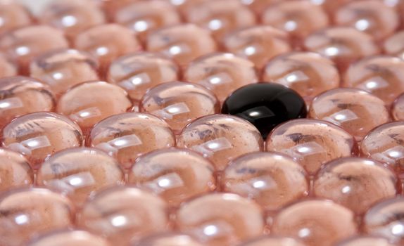 black glass stone in a pink glass stones