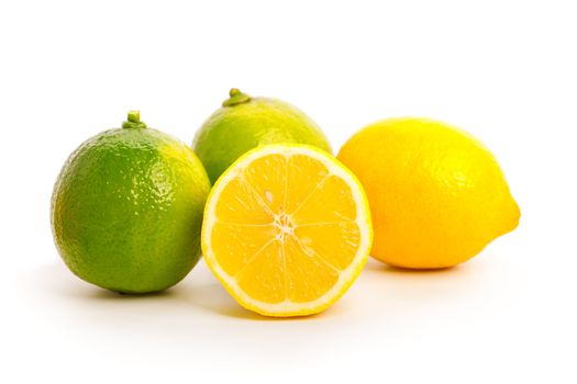 yellow and green lemon over white background.