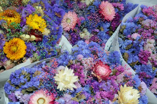 Blue and pink floral bouquets at market