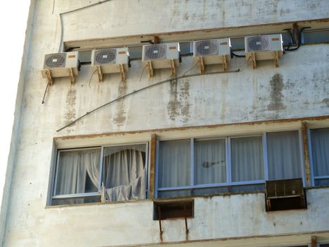 old air conditioning units on a building