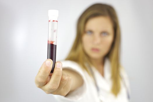 Doctor showing blood for study science and disease
