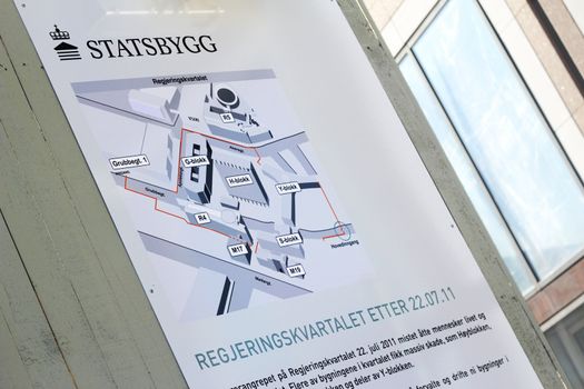 Information board about the reconstruction of the Government Quarter in central Oslo that was damaged under the terrorist attack 22.07.2011.