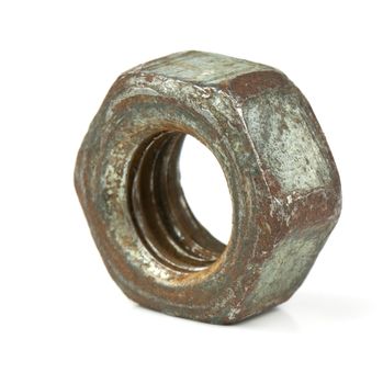 Old rusty nut on a white background