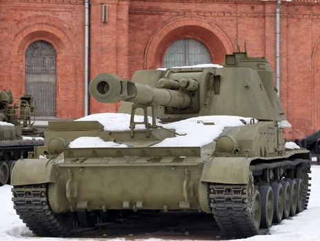 self-propelled cannon  against the fortress wall