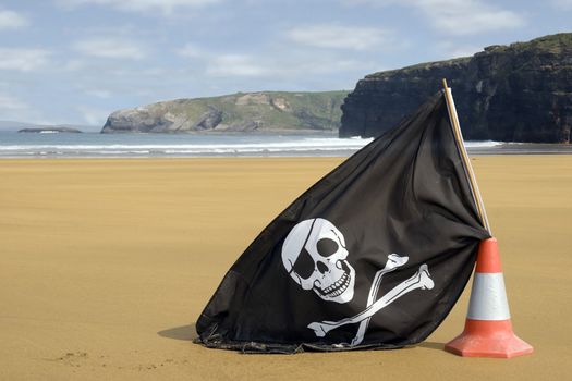 sandy golden beach with jolly roger flag in ballybunion county Kerry Ireland