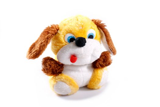 old children's toy dog on white background