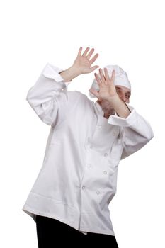 Portrait of a caucasian chef in his uniform on a white background.