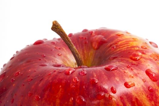 red apple with drops of close