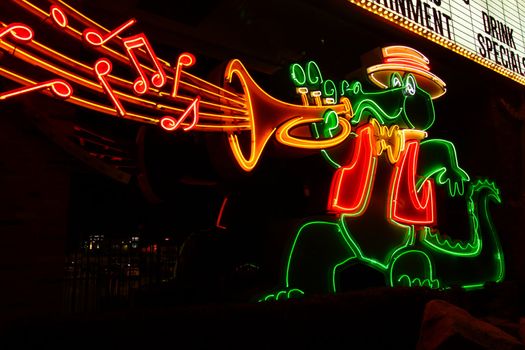 Las Vegas, USA - November 30, 2011: Musical Alligator Sign at the main entrance to The Orleans Hotel and Casino on Tropicana Avenue in Las Vegas.