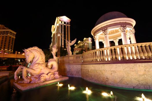 Las Vegas, USA - November 30, 2011: Sculptures and a small fountain serve as alluring decorations outside Caesars Palace, a hotel and casino on the famous Las Vegas Strip.