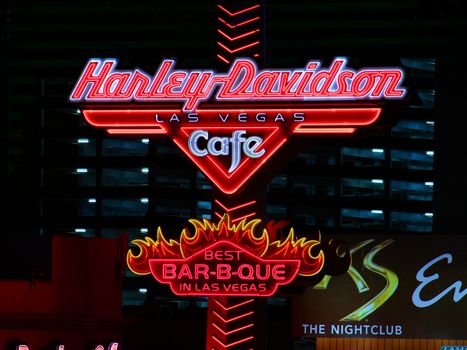Las Vegas, USA - November 30, 2011: Bright street sign of the Harley Davidson Las Vegas Cafe on the Las Vegas Strip, proclaiming the best barbecue in Las Vegas.