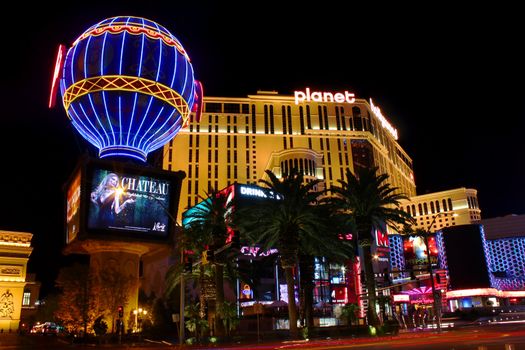 Las Vegas, USA - November 30, 2011: Planet Hollywood Resort and Casino on the Las Vegas Strip was formerly known as The Aladdin and is seen on the left.  Seen on the right is the Montgolfier Balloon Replica at the Paris Las Vegas hotel and casino.