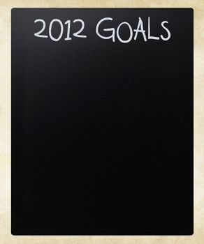 "2012 goals" handwritten with white chalk on a blackboard