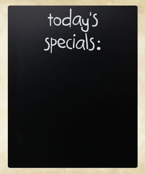"Today's specials" handwritten with white chalk on a blackboard