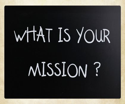 "What is your mission " handwritten with white chalk on a blackboard