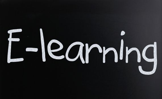 The word "E-learning" handwritten with white chalk on a blackboard