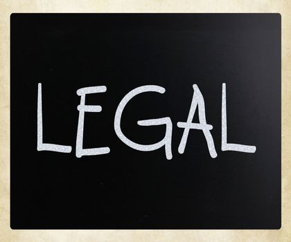 The word "Legal" handwritten with white chalk on a blackboard