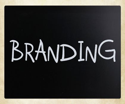 "Branding" handwritten with white chalk on a blackboard