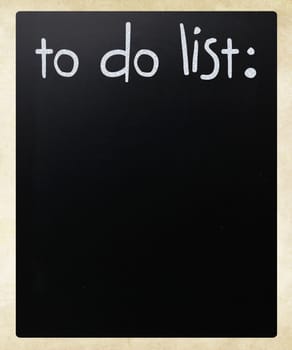 "To do list" handwritten with white chalk on a blackboard