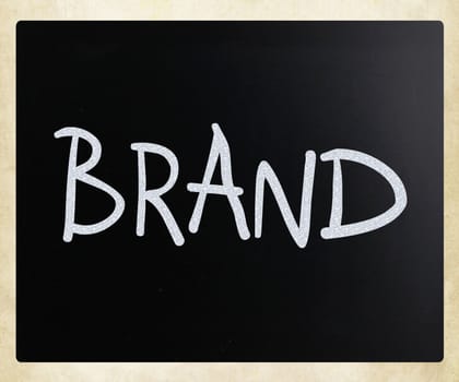 "Brand" handwritten with white chalk on a blackboard