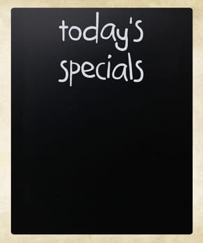 "Today's specials" handwritten with white chalk on a blackboard