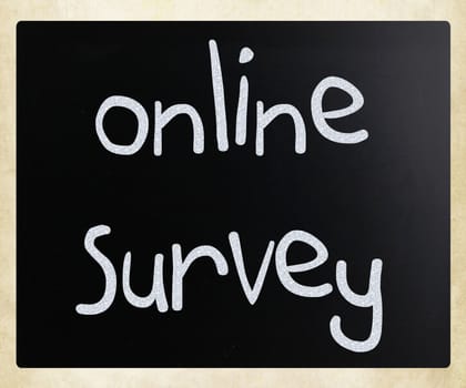 "online survey" handwritten with white chalk on a blackboard