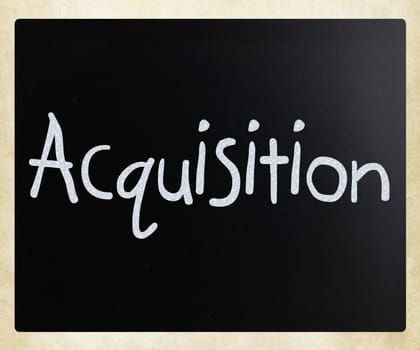 The word "Acquisition" handwritten with white chalk on a blackboard