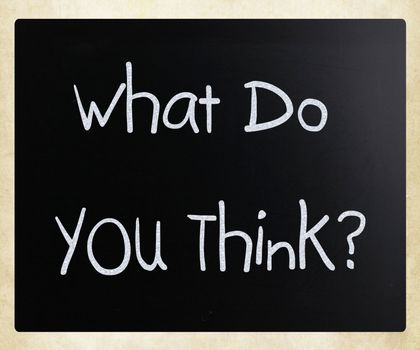 "What do you think?" handwritten with white chalk on a blackboard