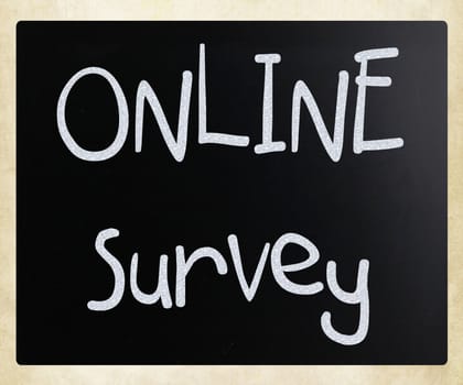 "online survey" handwritten with white chalk on a blackboard